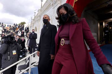 Michelle and Barack Obama descend stairs at President Joe Biden&#x27;s inauguration