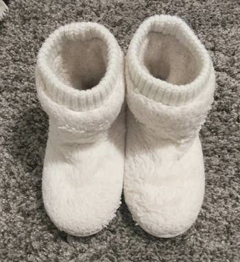 reviewer photo of white slippers