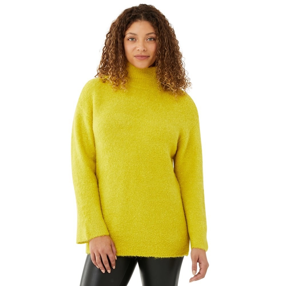 model in cozy funnel neck tunic sweater