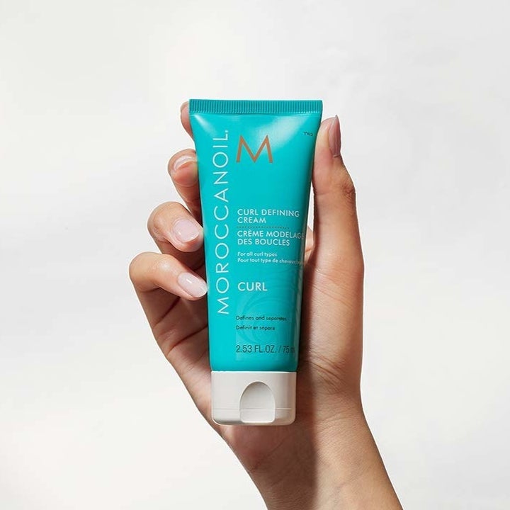 The bottle of curl cream
