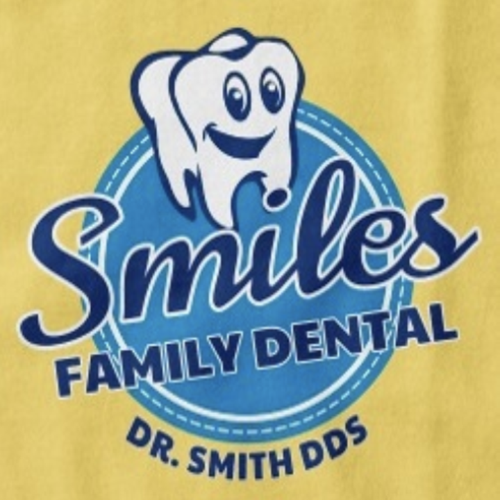 A custom Smiles Family Dental shirt with a smiling tooth illustration
