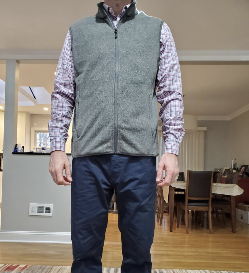 A reviewer wearing the vest