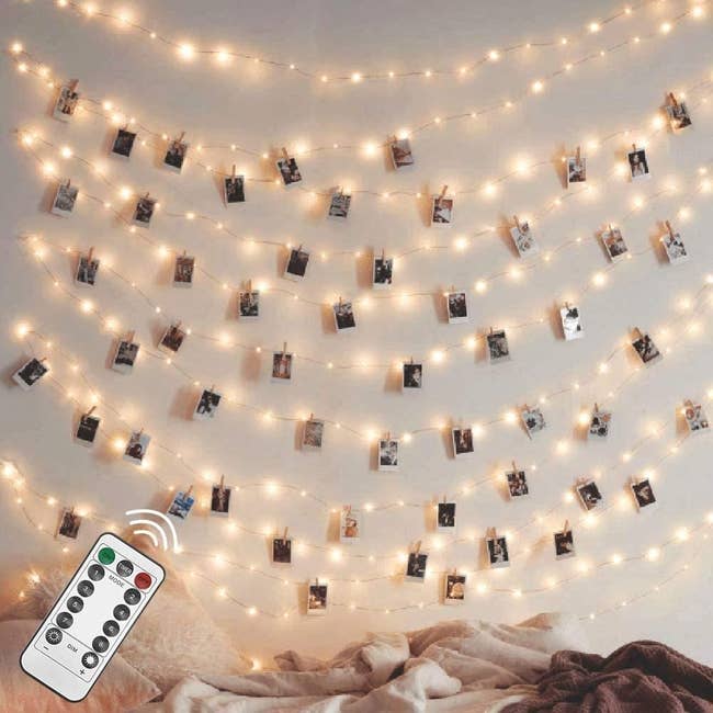 strings of lights with polaroid photos hanging from them