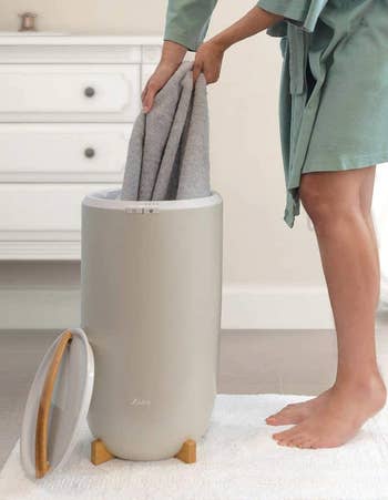 A exemplary pulling a towel retired of the metallic towel warmer