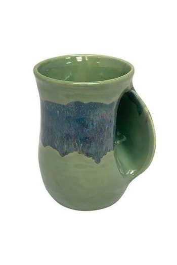The front of the mug in misty green