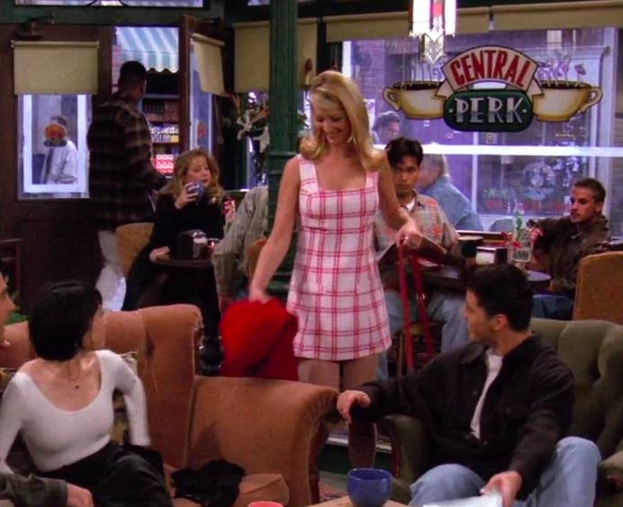 Phoebe wearing a plaid dress