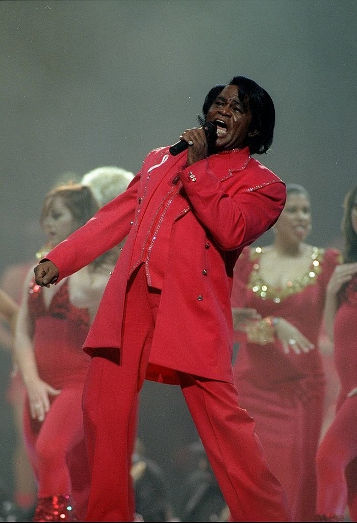 James Brown onstage in an all-red suit