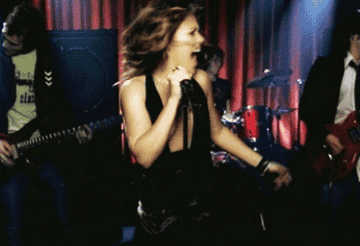 Kelly Clarkson shaking her head and rocking out in the &quot;Since U Been&quot; gone music video
