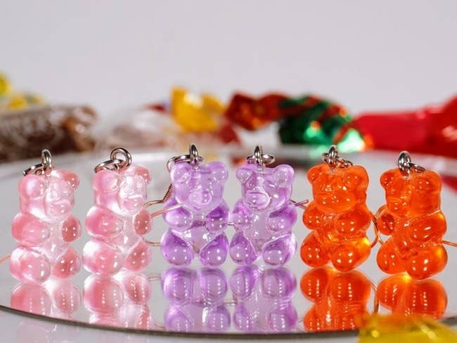 The gummy bear-shaped drop earrings in pink, purple, and orange