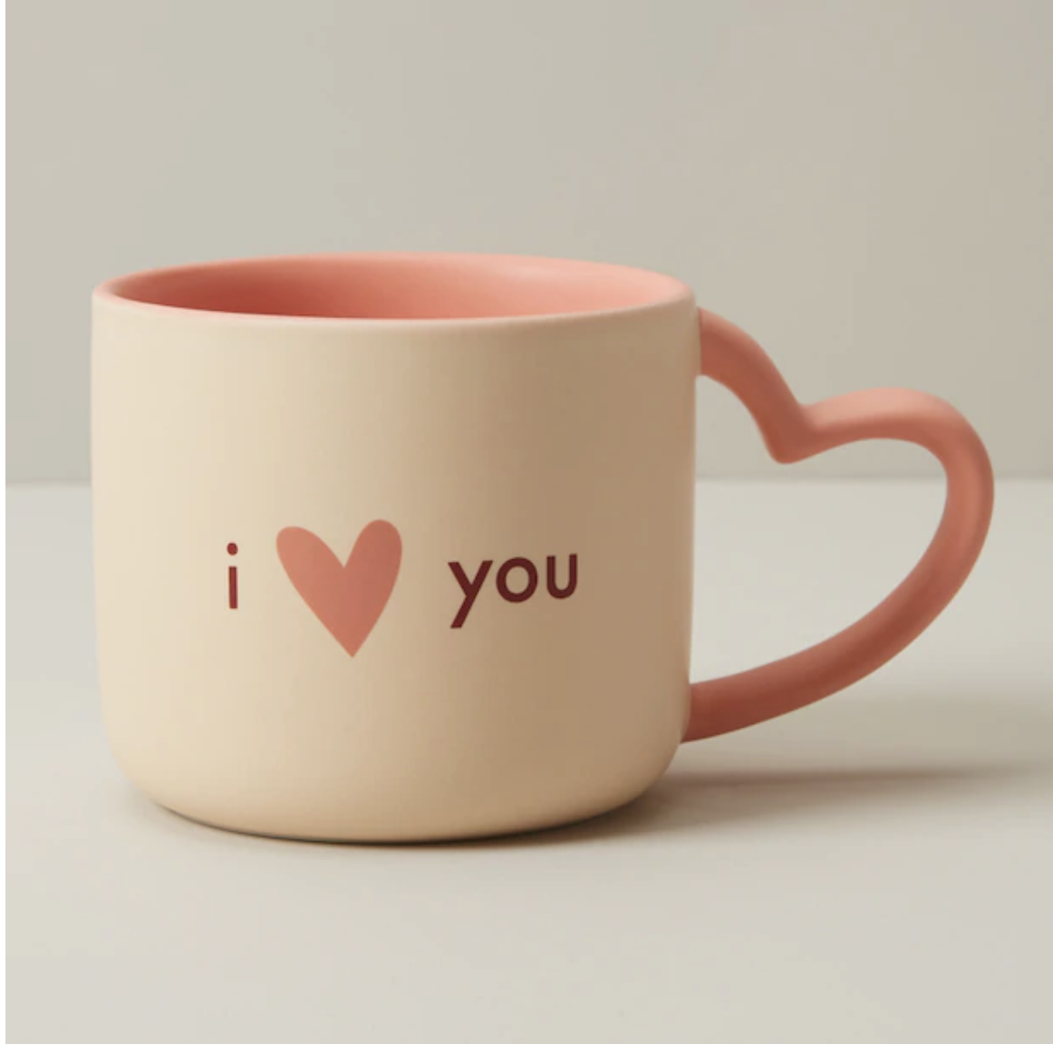 the mug that says I love you with a heart shaped handle