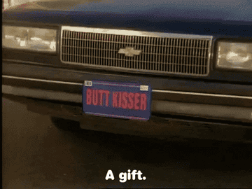 A license plate reads &quot;butt kisser.&quot;