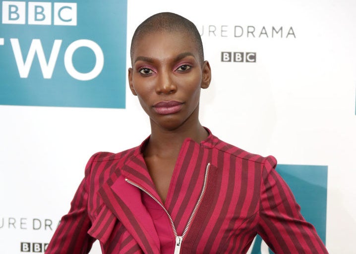 Michaela Coel posing on a red carpet