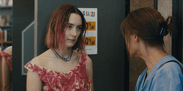 Saoirse Ronan walks into a dressing room as Lady Bird in &quot;Lady Bird&quot;