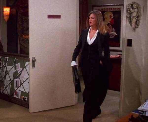 Rachel wearing a suit to work