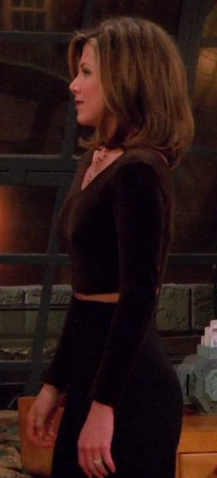 Rachel wearing a long-sleeve crop top and high-waisted pants