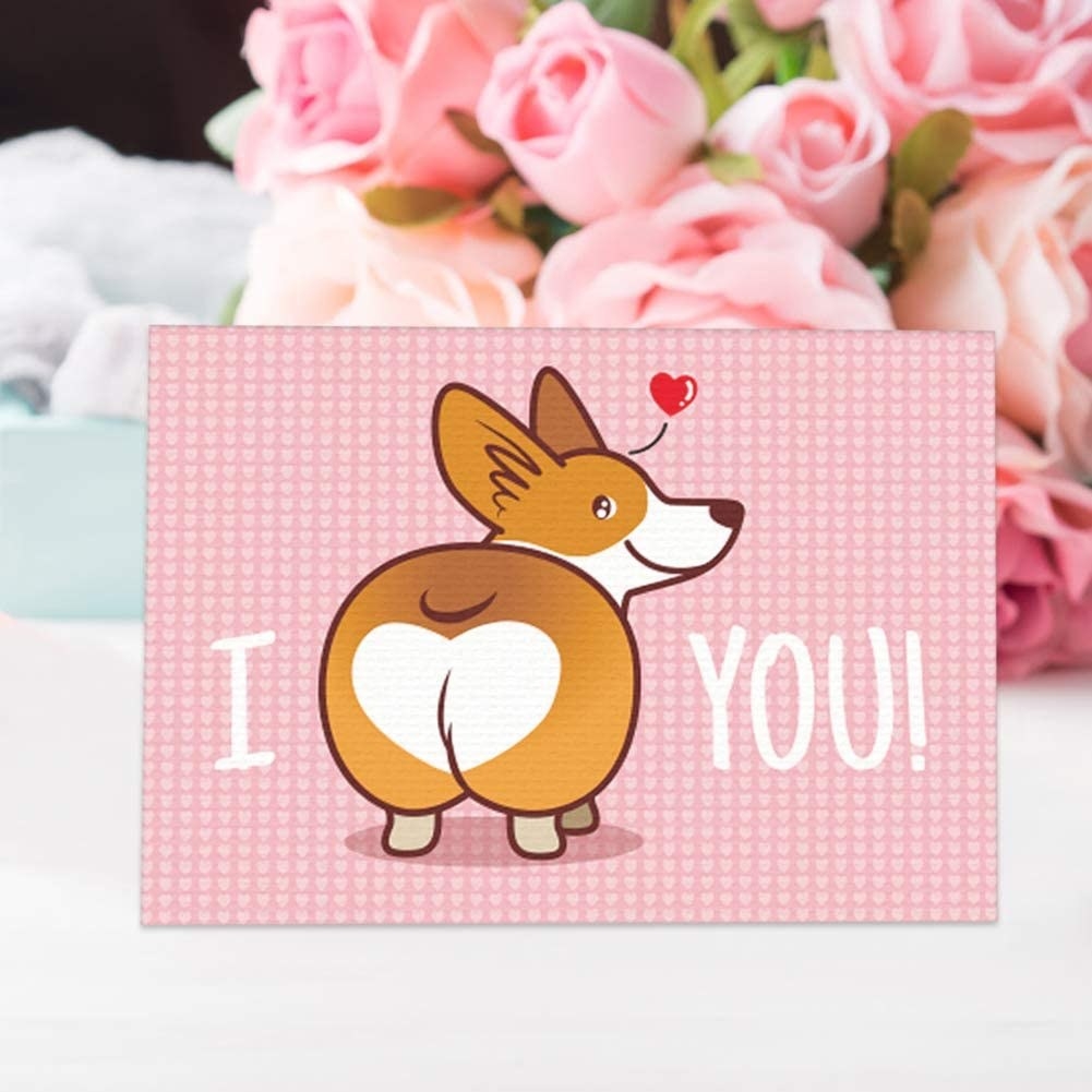 A drawing of a Corgi with a heart on its butt, with &quot;I (heart) you&quot; written around it