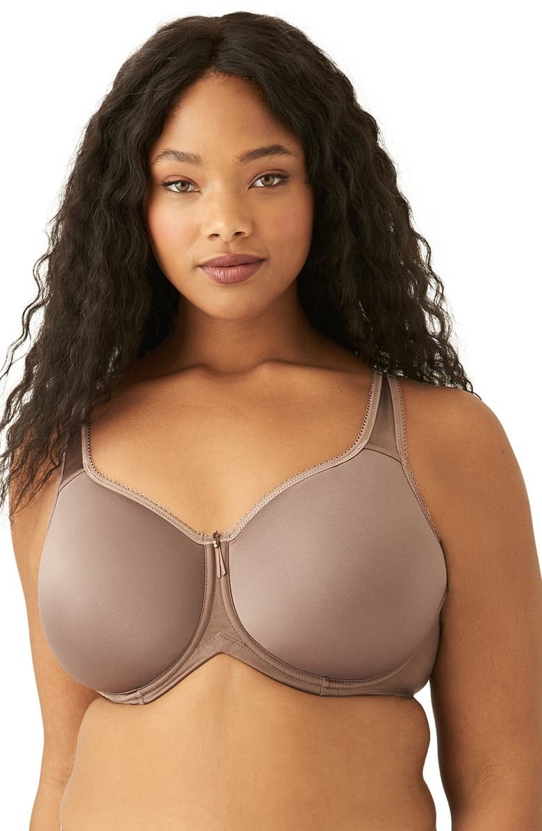 A person wearing the bra, in Deep Taupe