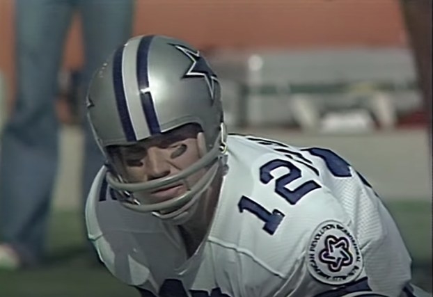 Roger Staubach playing quarterback.