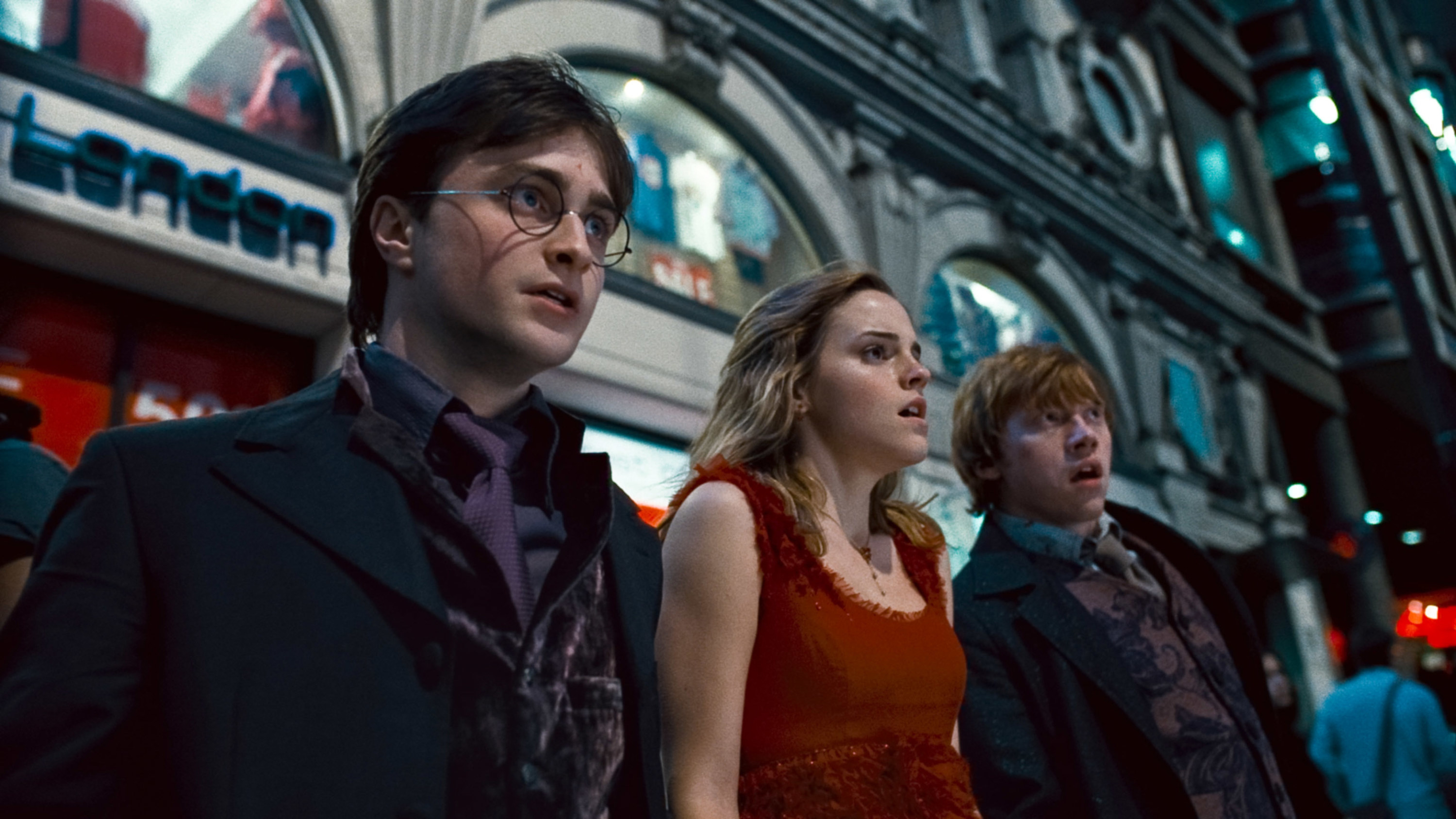 Harry, Hermione, and Ron on the run in London