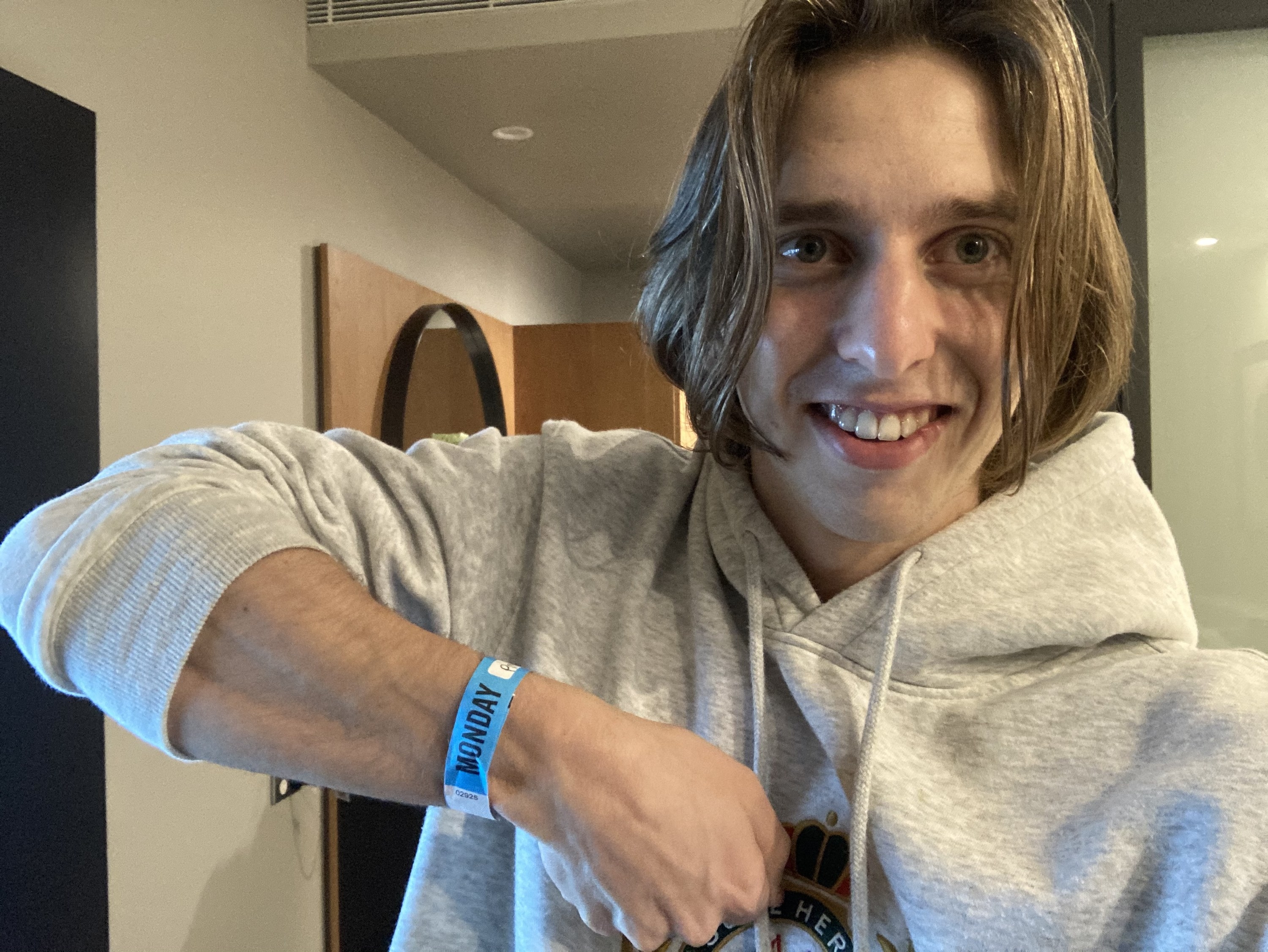 Stephen shows off his wristband which allows him to leave