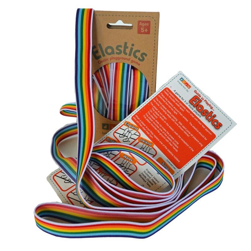 An elastic rainbow game string set coming out of its packaging