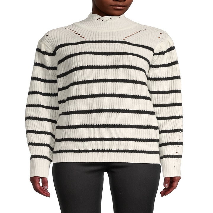 model wearing a black and white striped sweater