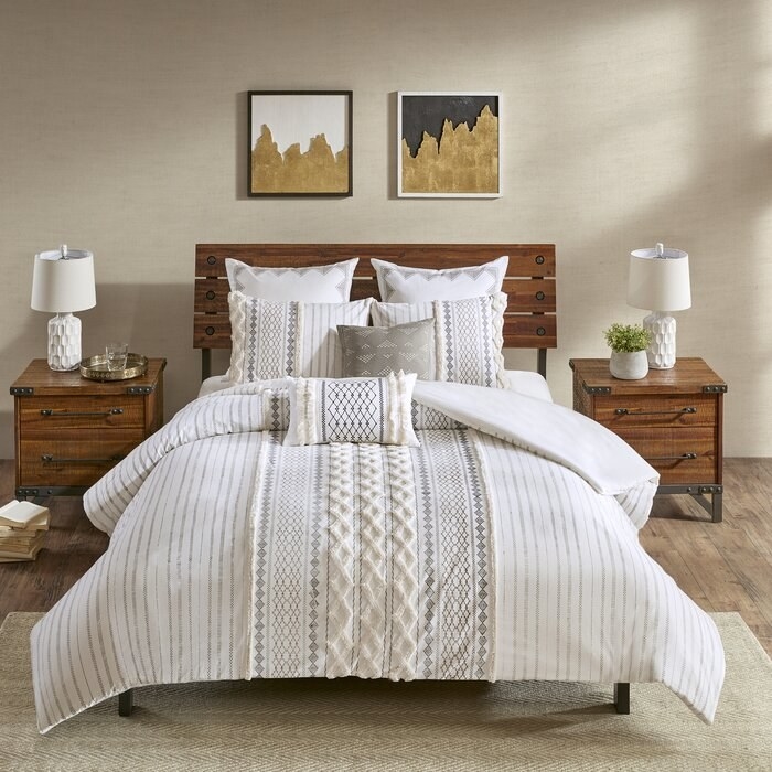 duvet cover with tufted and textured accents running down the middle