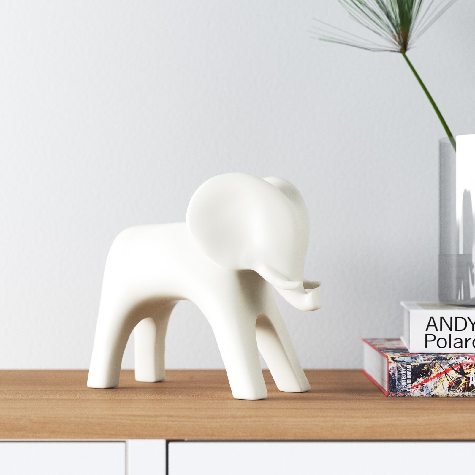 white elephant figurine on a table