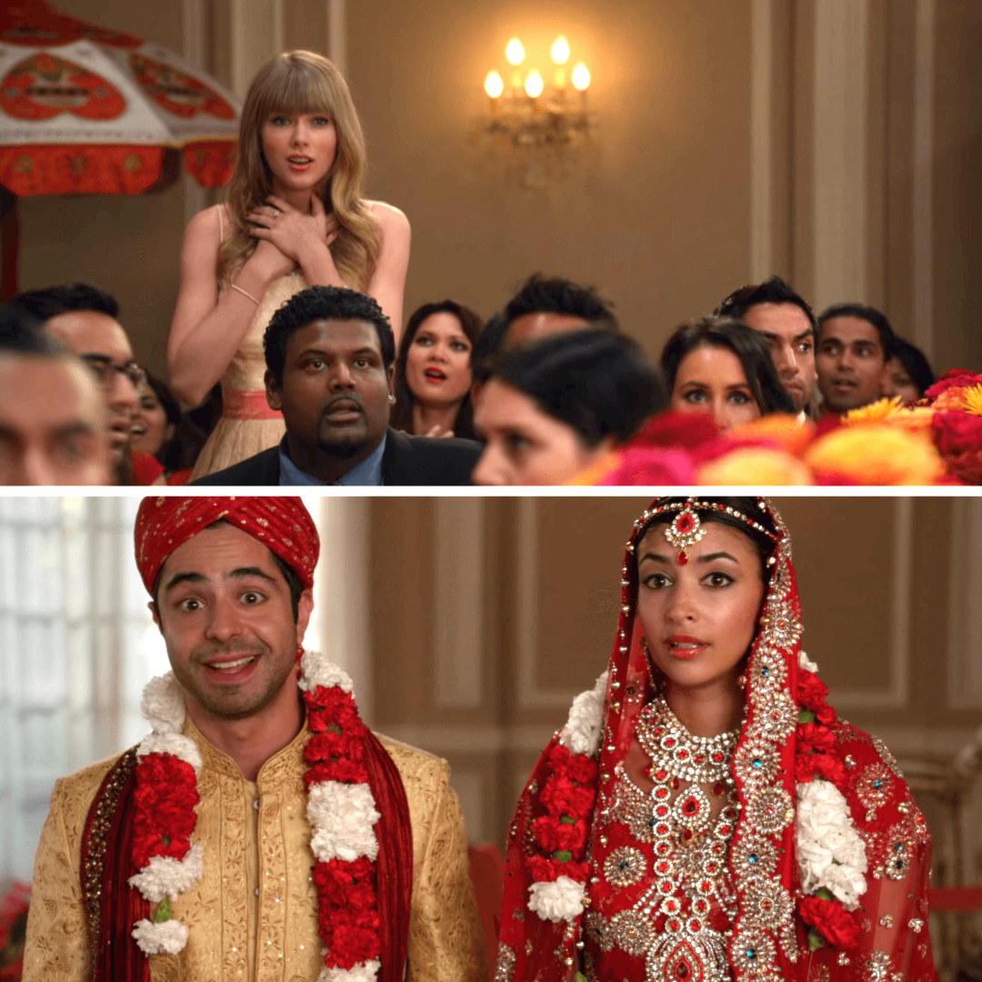 Taylor Swift standing up with her hands on her heart during Cece and Shivrang&#x27;s wedding on New Girl