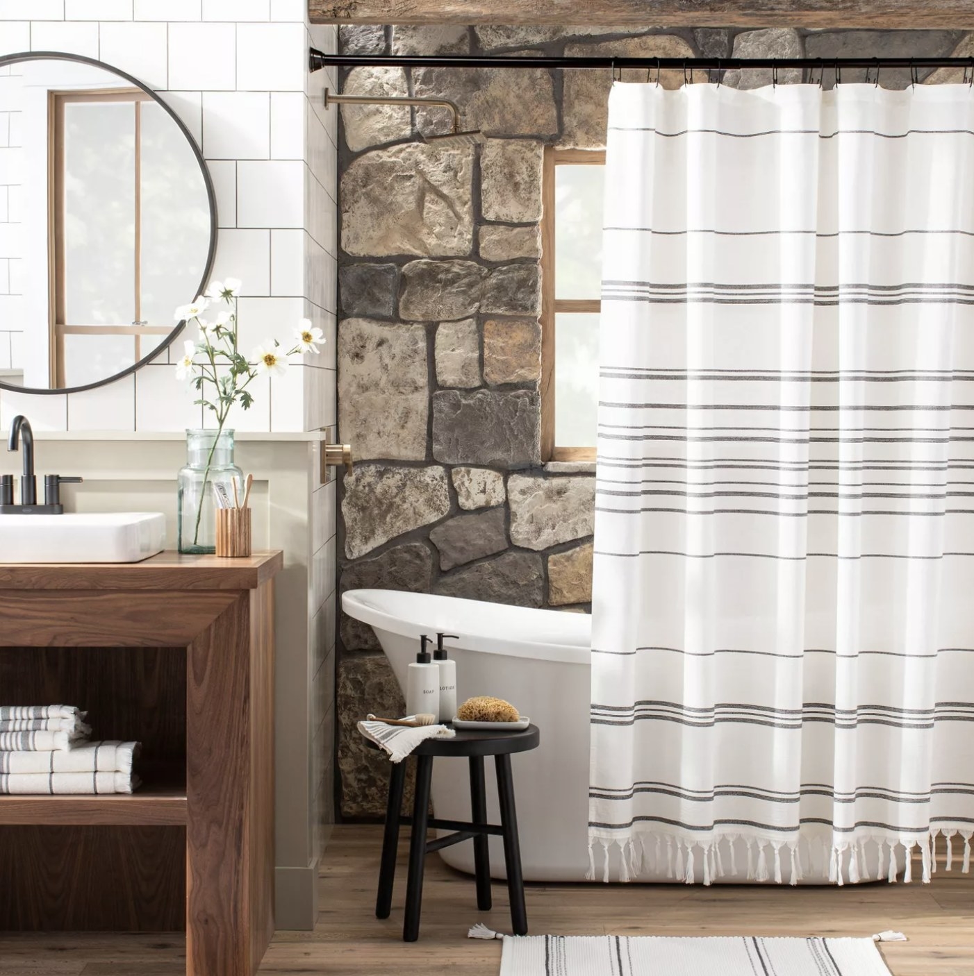 White striped shower curtain in a bathroom