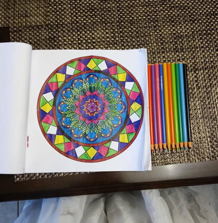 reviewer photo showing a page from coloring book colored in