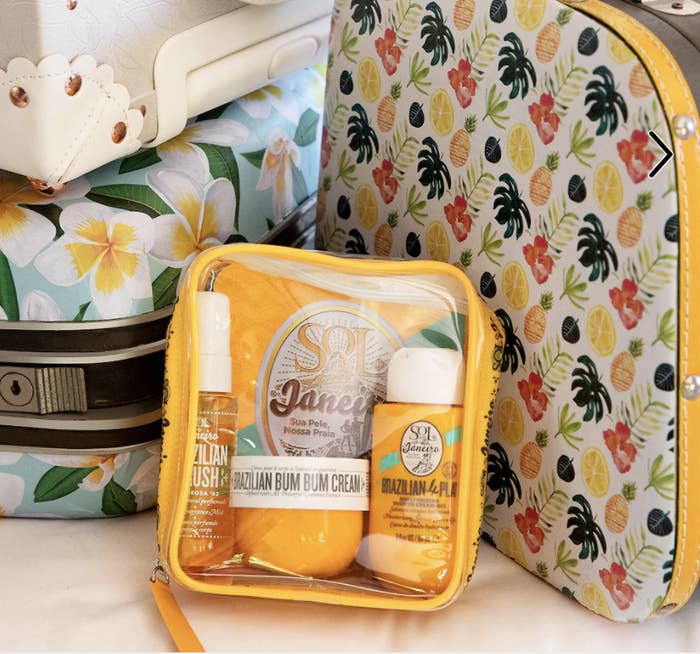 the trio of products in a travel bag among suitcases