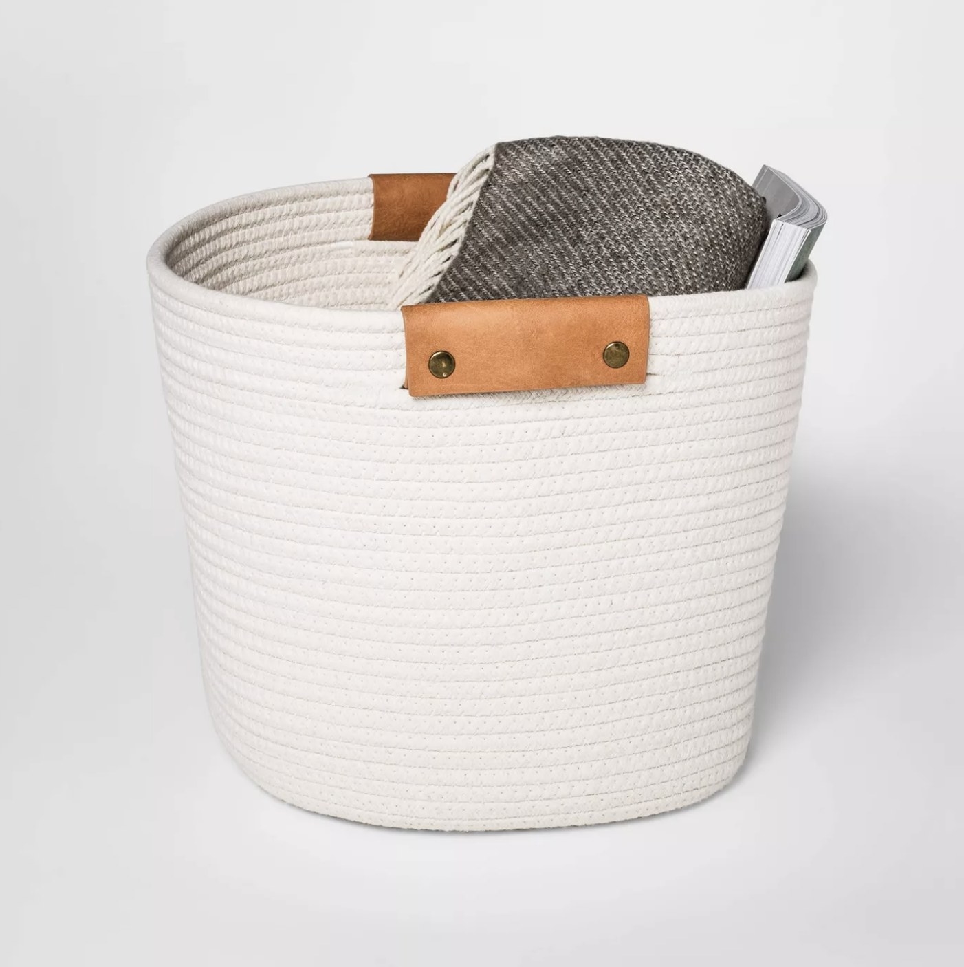 A white coiled rope basket