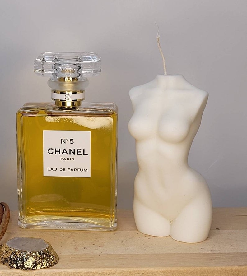 Venus candle next to Chanel perfume for size reference (about the same height)