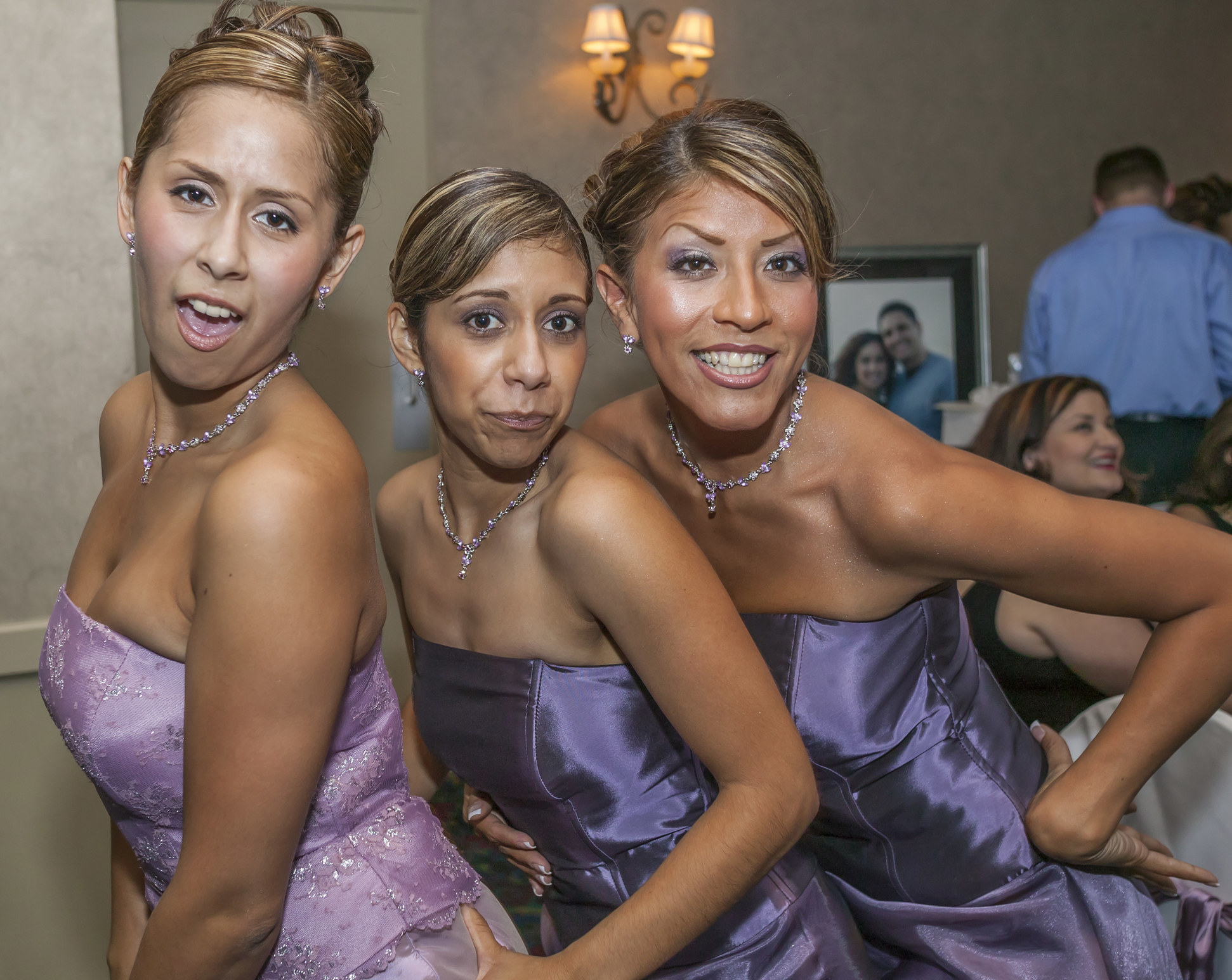 A trio of bridesmaids with matching dresses