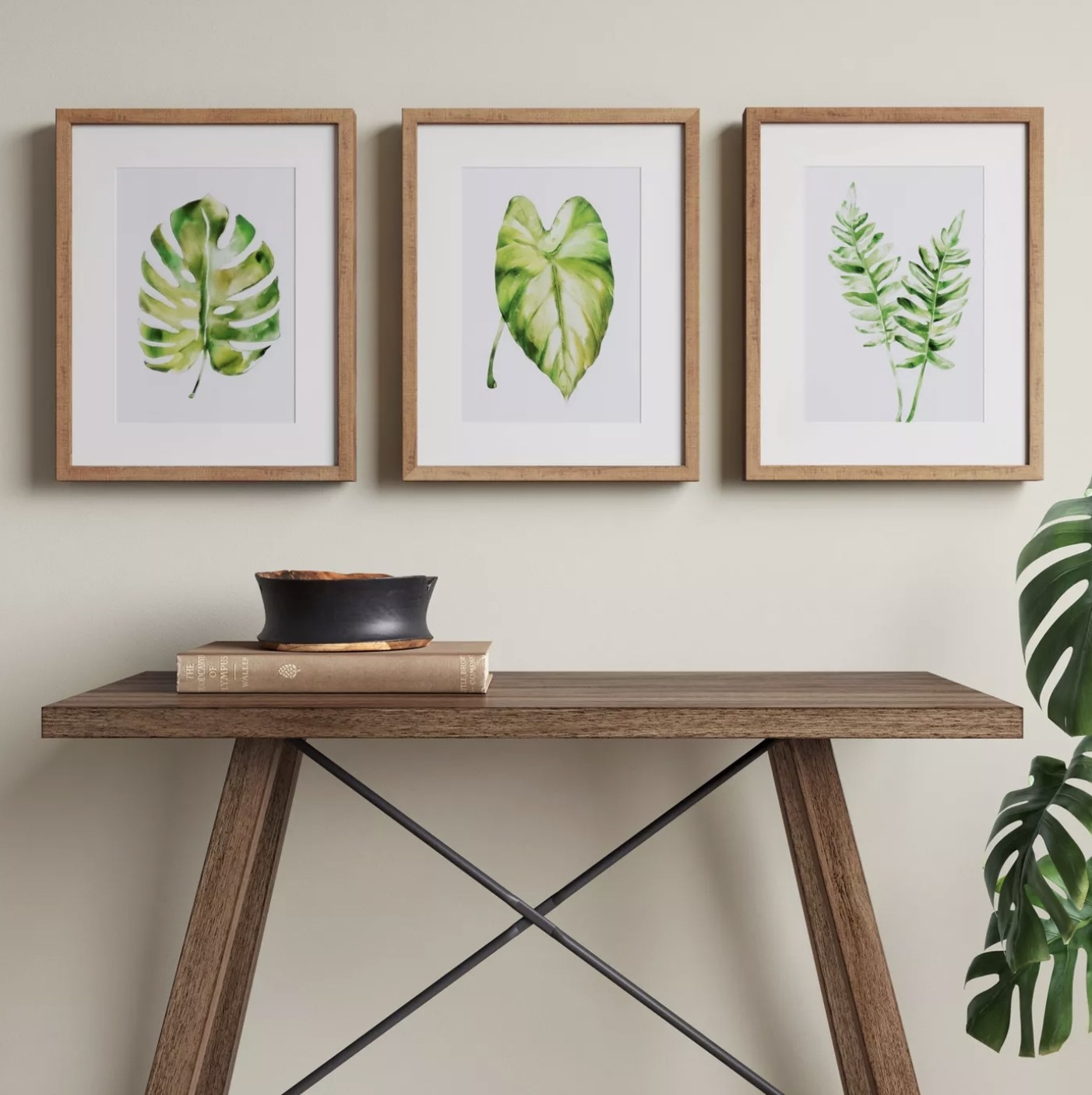 Three framed painted leafs
