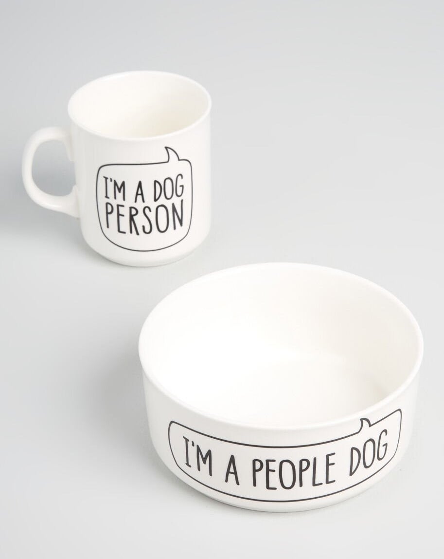 The white set that has a coffee mug that says "I'm a dog person" and a dog bowl that says "I'm a people dog"