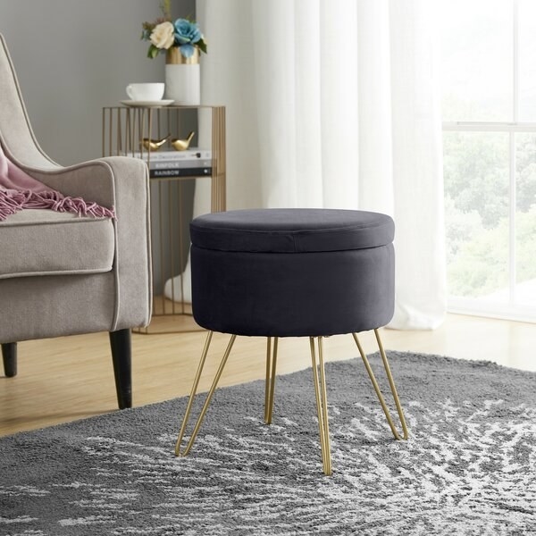 The ottoman with metal hairpin legs