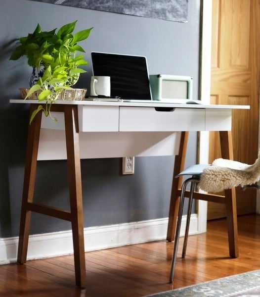 The white and wooden desk