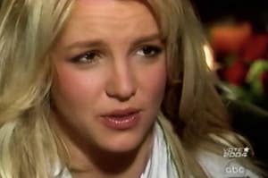 Britney looking pained and upset in the interview
