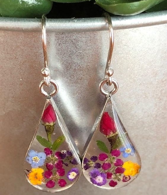 Reviewer&#x27;s picture of the floral teardrop earrings