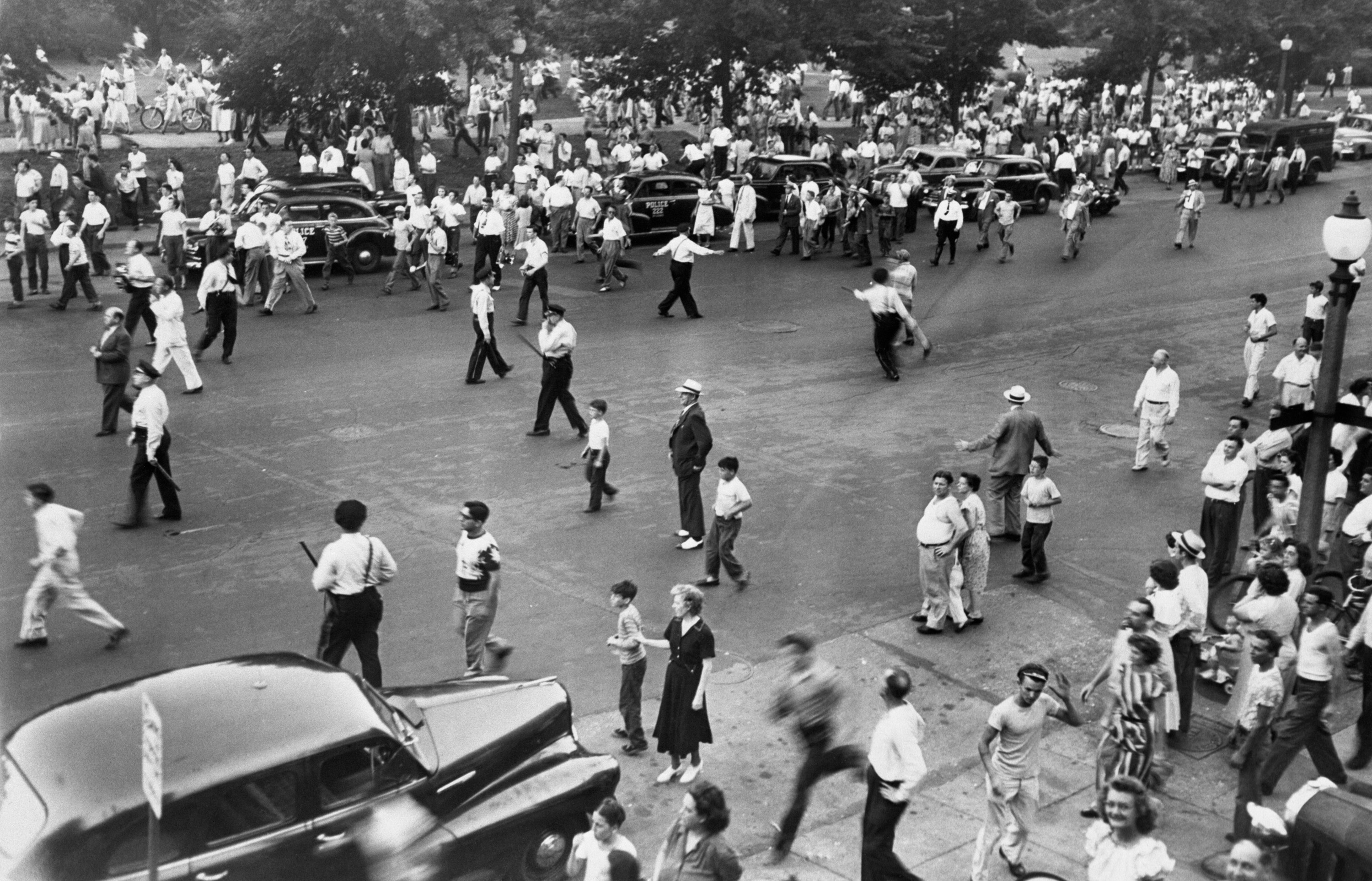 Police armed with nightsticks disperse part of a crowd of 5,000 persons during a race riot in St. Louis, June 21st