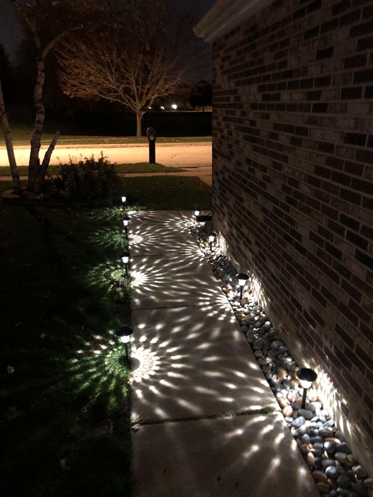 a reviewer photo of the LED pathway lights lit at night