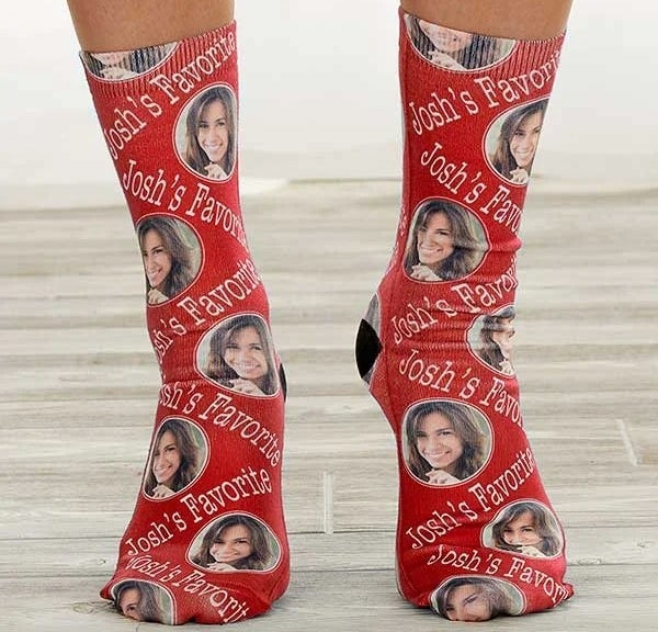 A close up of the socks in red worn by a model