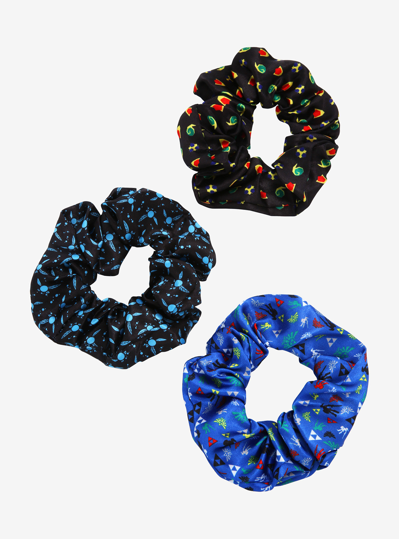 three scrunchies with zelda icon patterns on it