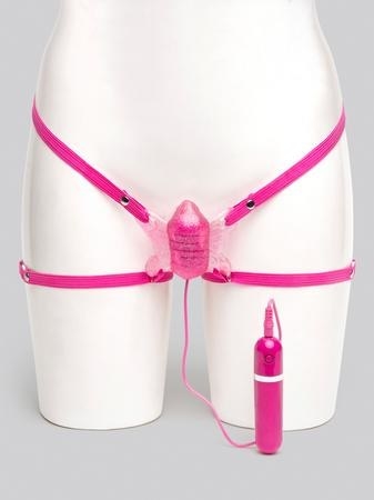 vibrator with straps across the hips and around the thighs so the vibrator part hits against the clitoris