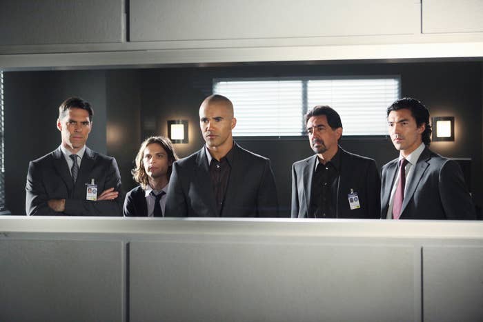 Five major characters from Criminal Minds standing together