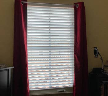 sunblock curtains open to show how bright it is outside