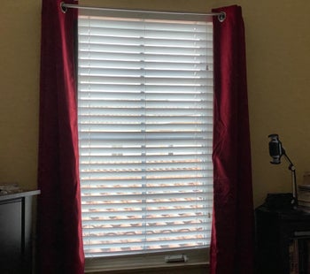 sunblock curtains open to show how bright it is outside