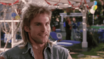 A gif of Seann William Scott reprising his role as Stifler in a SuperBowl ad, pumping his fist in joy